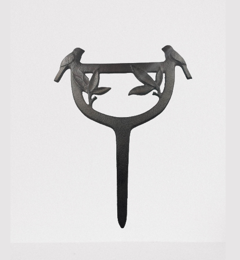 Gratte pied en fonte oiseau